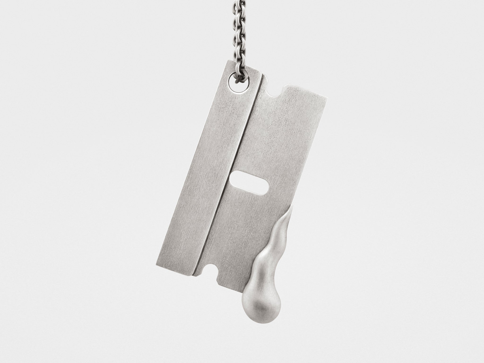 Sharp Edge Razor Pendant in Silver